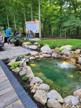 paver patio with pond
